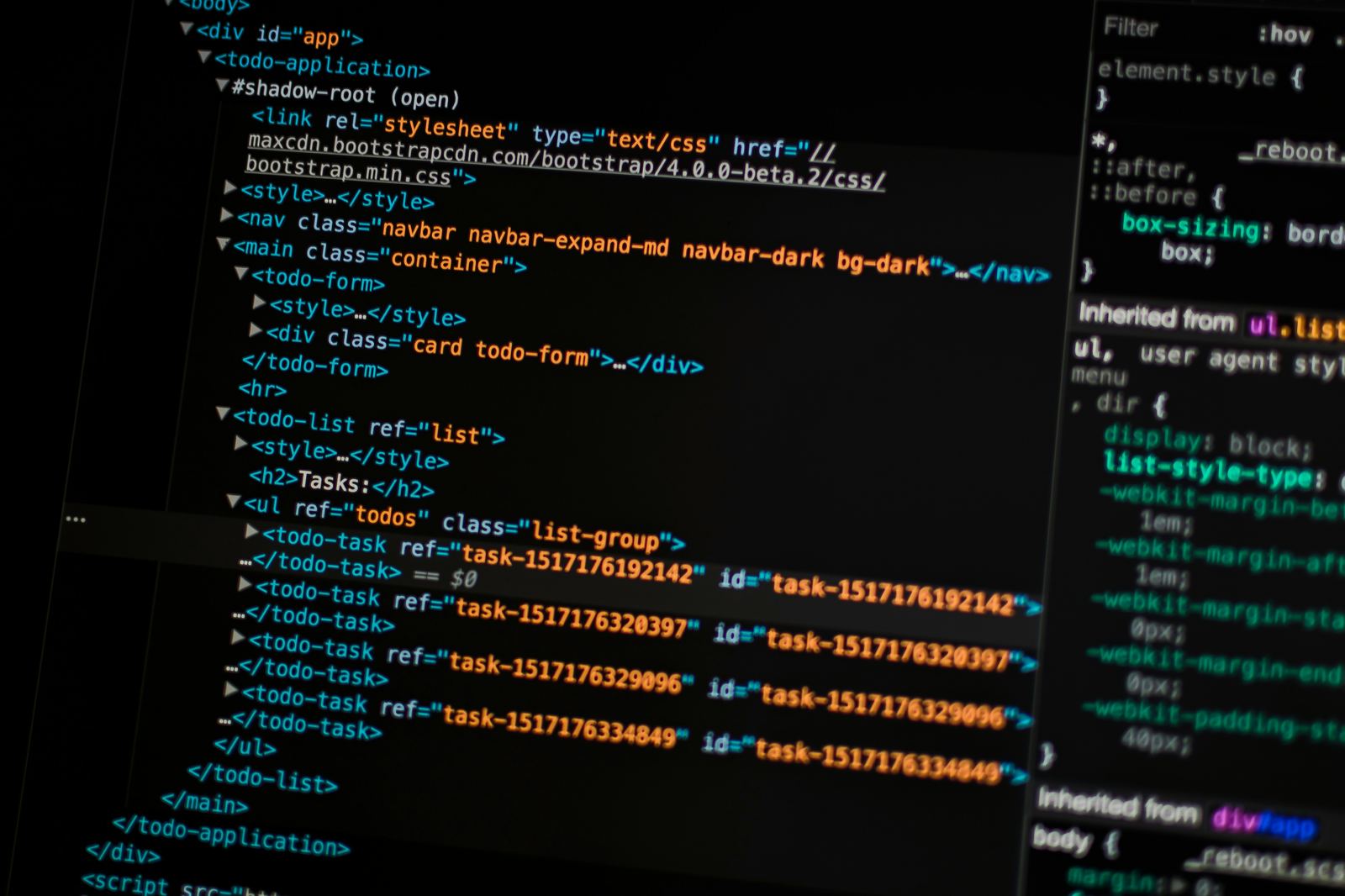 Monitor displaying lines of programming code