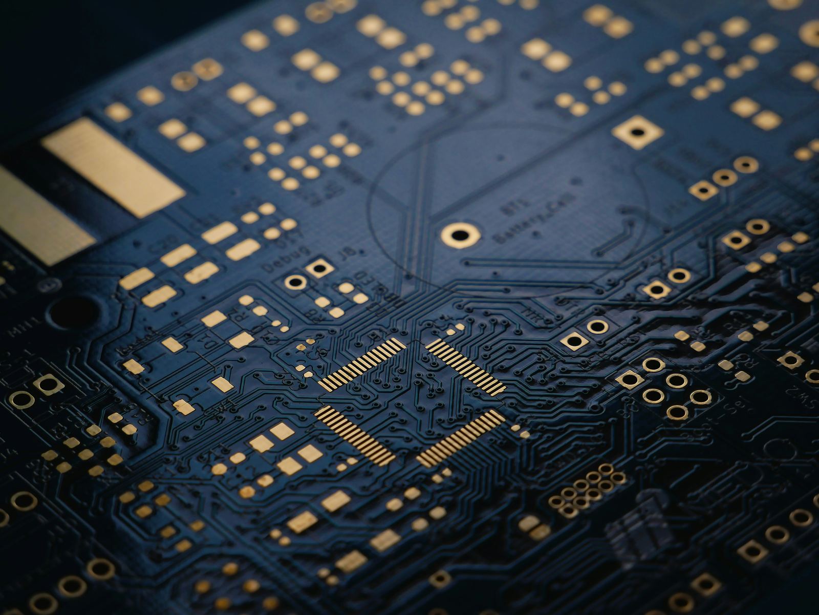 Close-up of a dark blue circuit board
